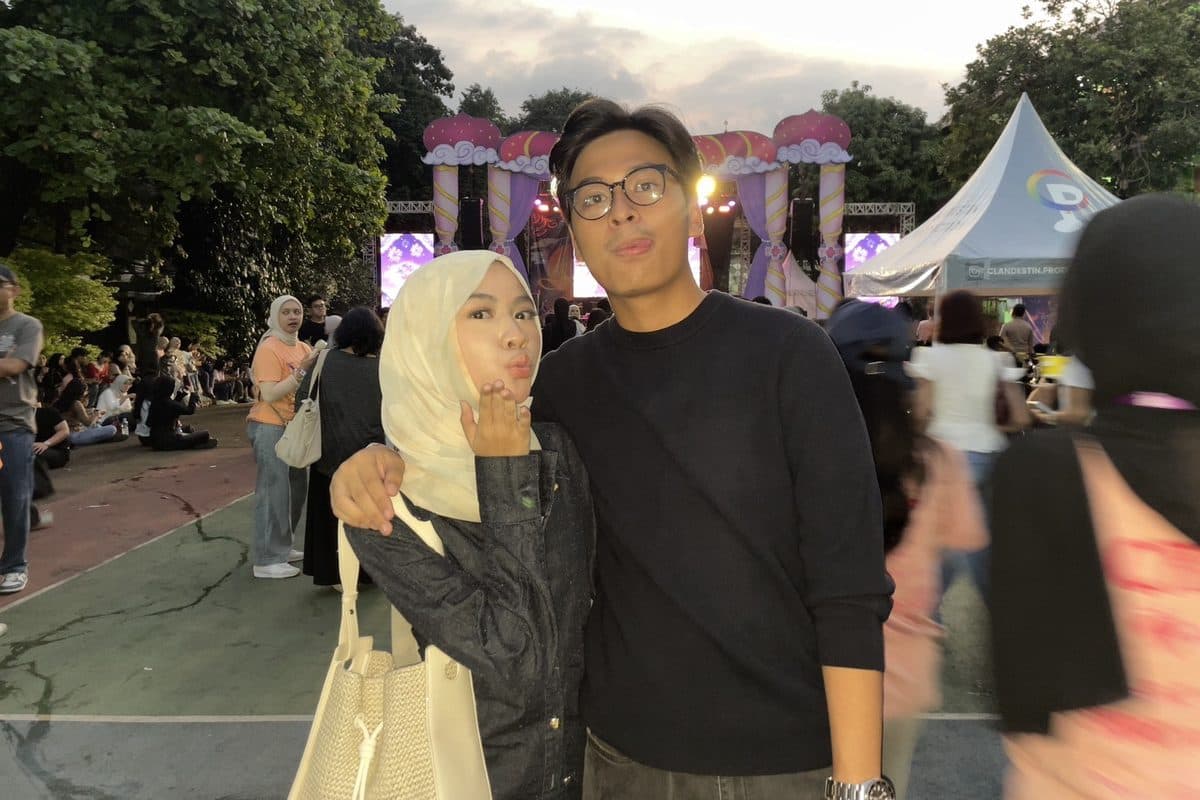 Dhanes and a friend at an outdoor festival